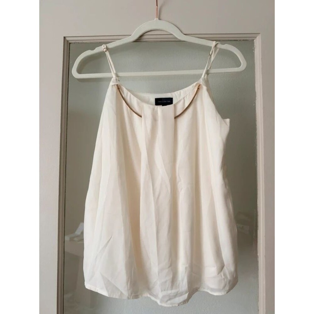 The limited blouse with chain detail